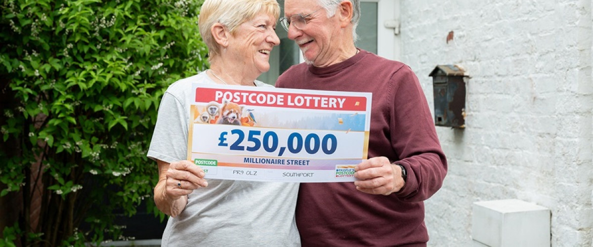 £250,000 Postcode Lottery WInner Hit for Six